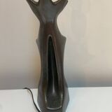 Black glazed ceramic lamp in the shape of a woman attributed to Jacques Bli
