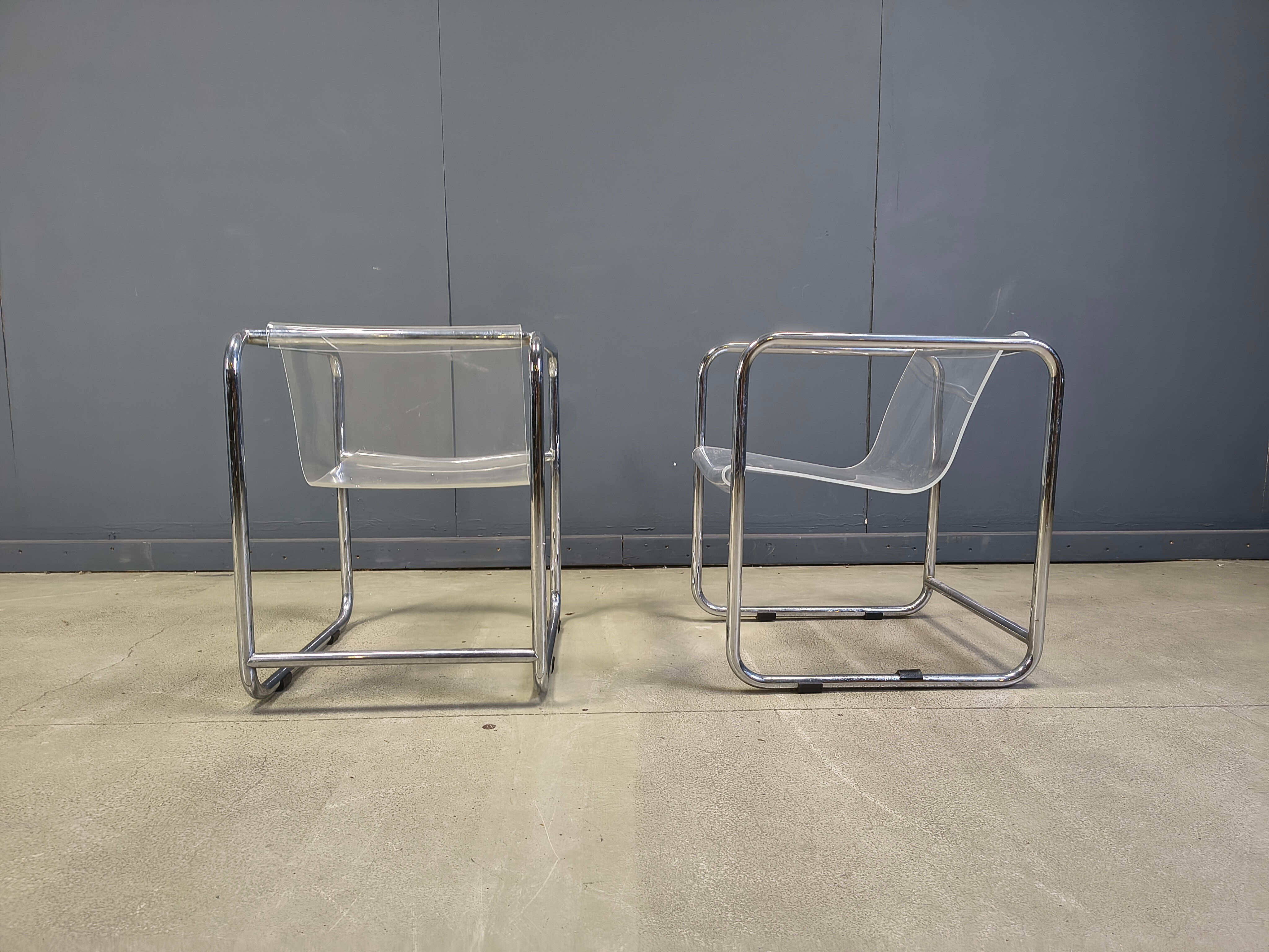 Pair of plexiglass and tubular chrome armchairs, 1970s