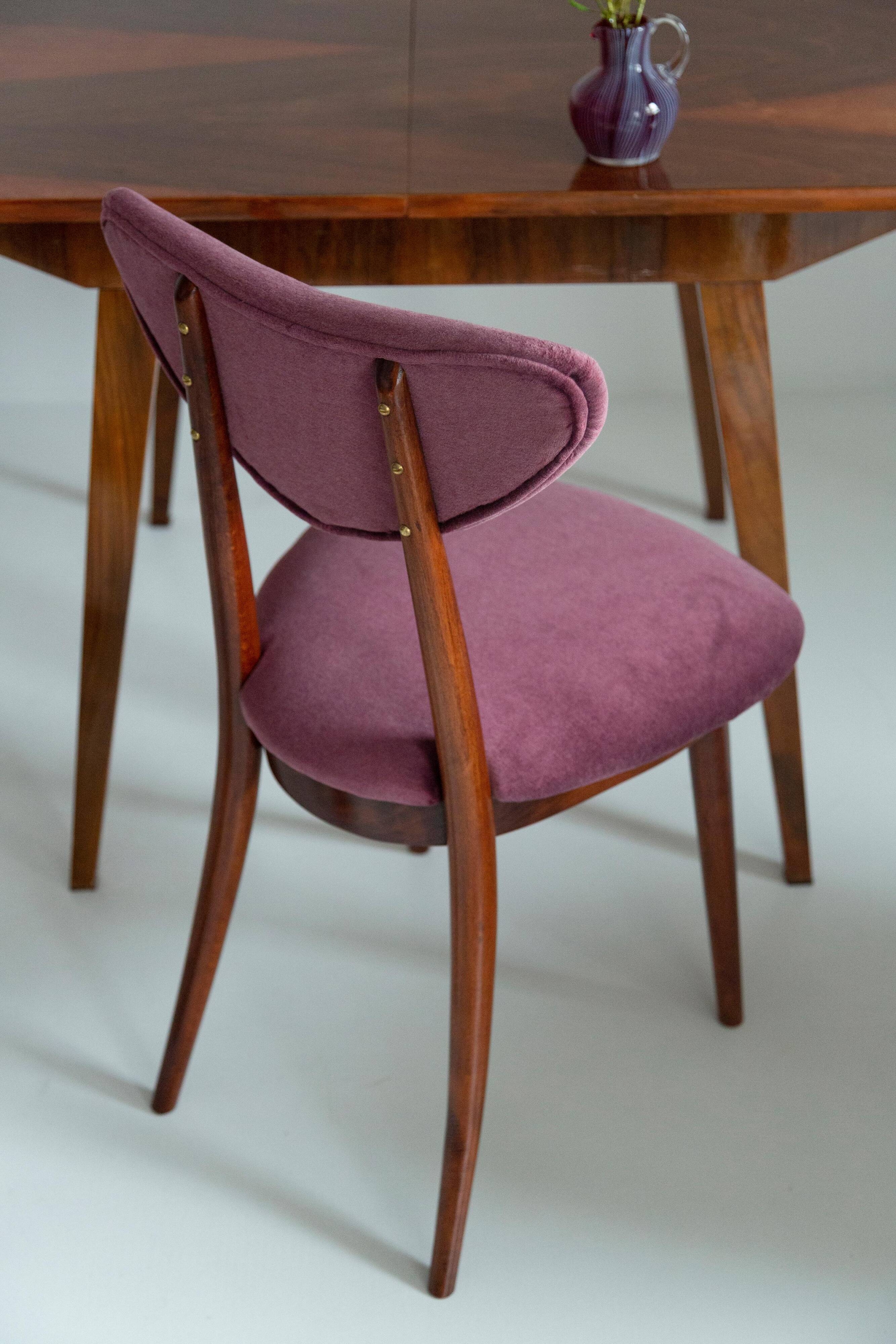 Vintage mid-20th century purple plum velvet heart-shaped chair.