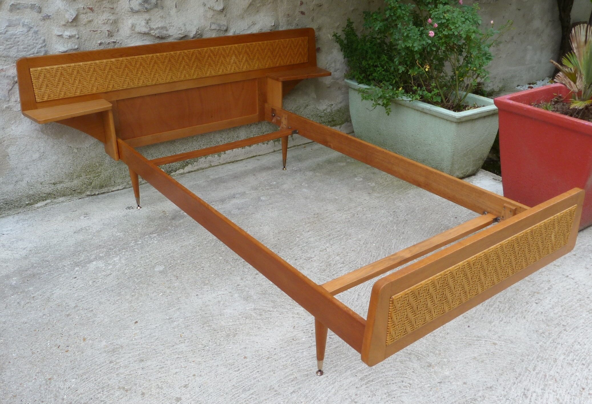 Wooden bed and rattan