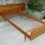 Wooden bed and rattan