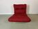 Vintage red shell lounge chairs from the 70s mid-century retro.