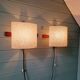 Pair of Scandinavian wall sconces in teak and plastic resin, 1960.