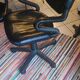 Two black leather armchairs