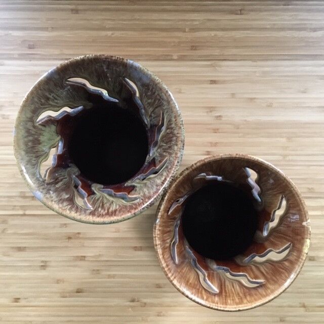 Pair of flaming ceramic vases