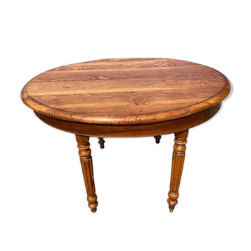 Oval solid oak table with 4 extensions