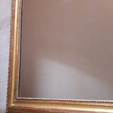 Golden mirror with pediment XIXth