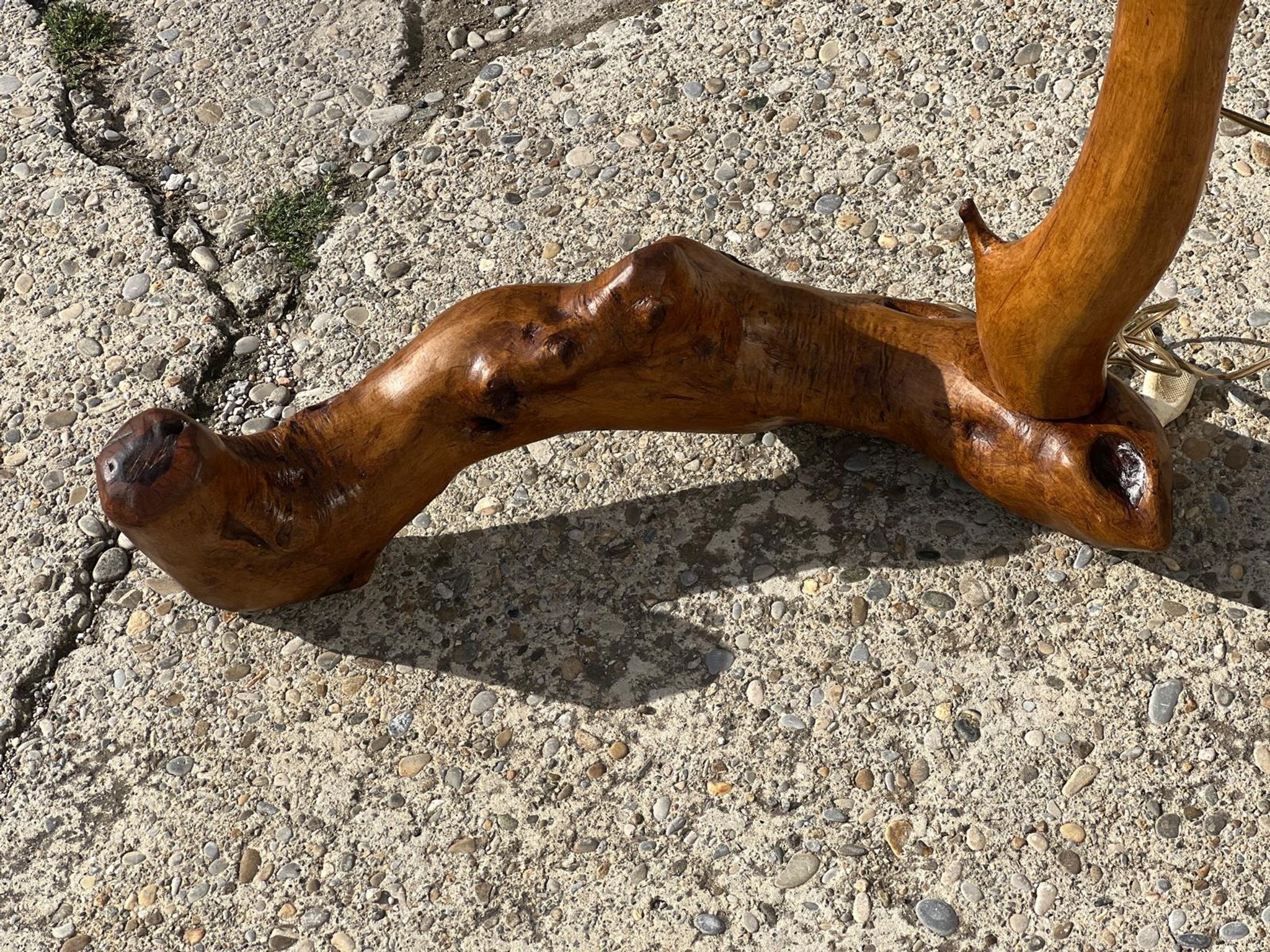 Floor lamp in solid olive wood, Brutalist style, French work from the 1970s.