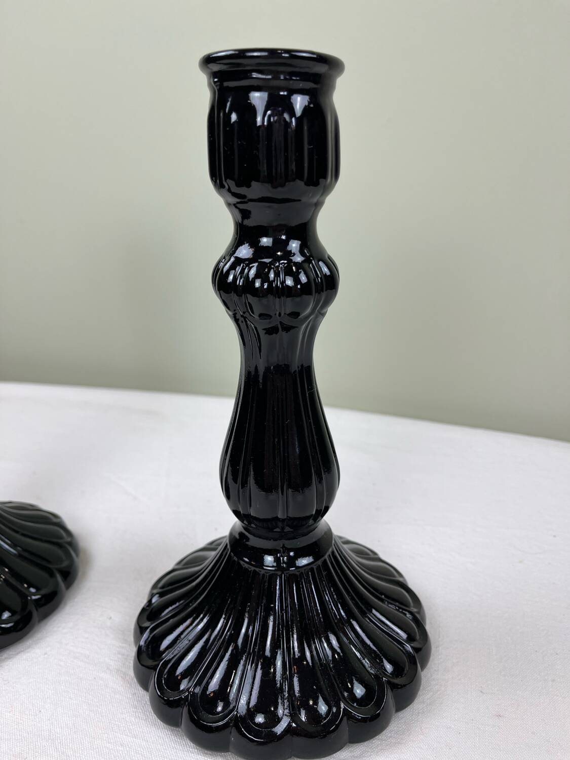 Pair of black opaline candlesticks