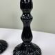 Pair of black opaline candlesticks