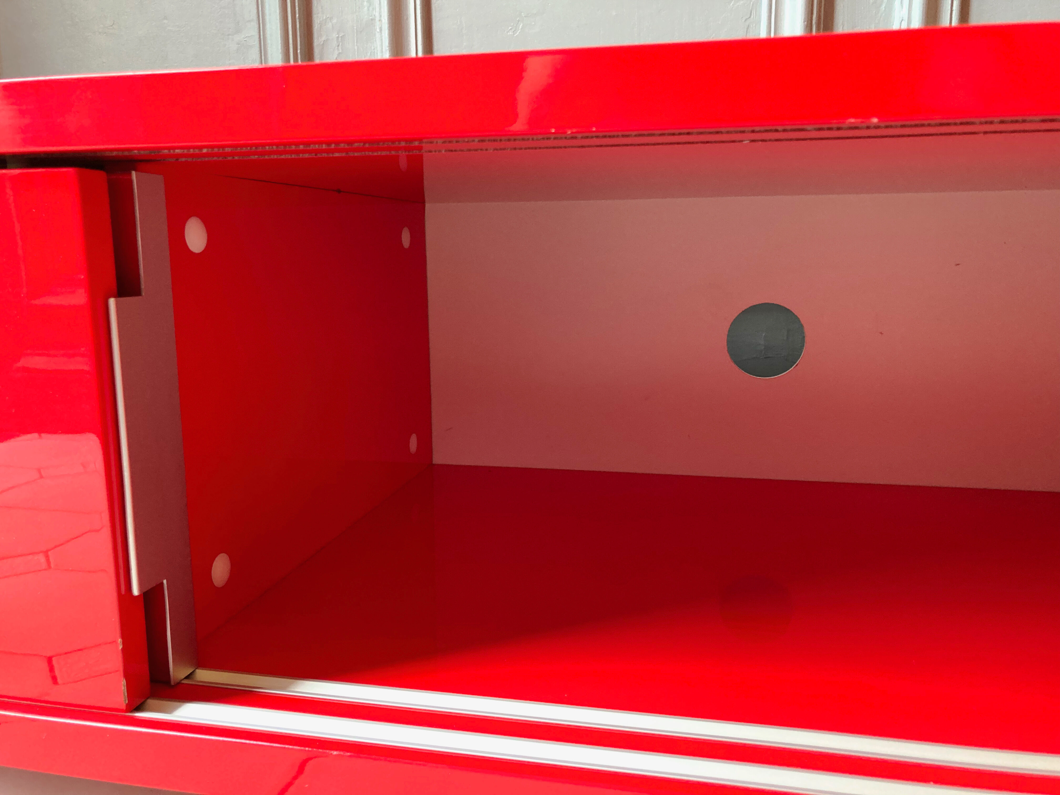 Lacquered red tv cabinet