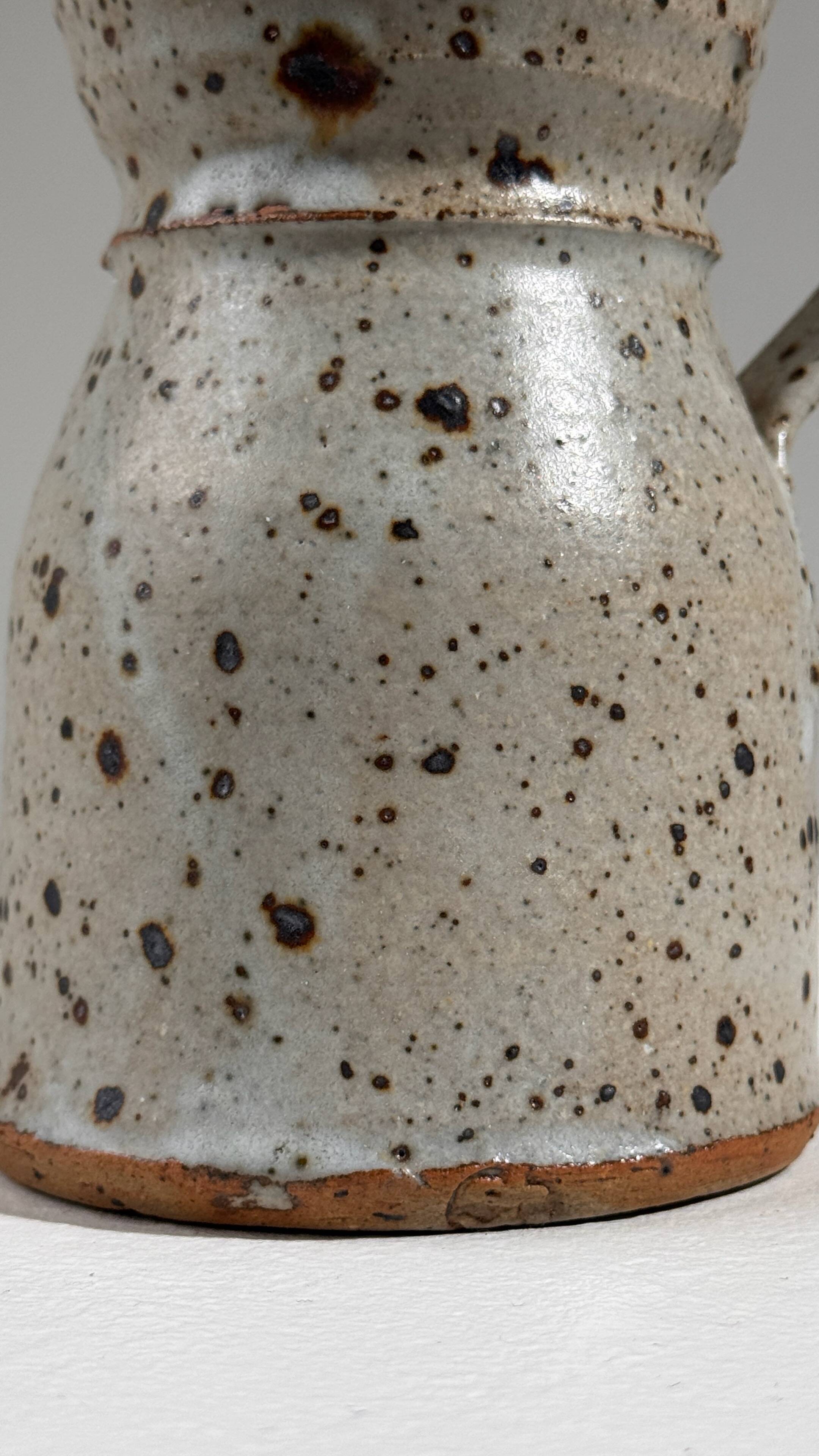 Small stoneware jug by Gustave Tiffoche