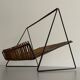 Mid-century black metal and rattan magazine rack, 1960, Italy