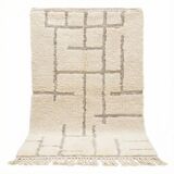 Moroccan rug with black graphic pattern