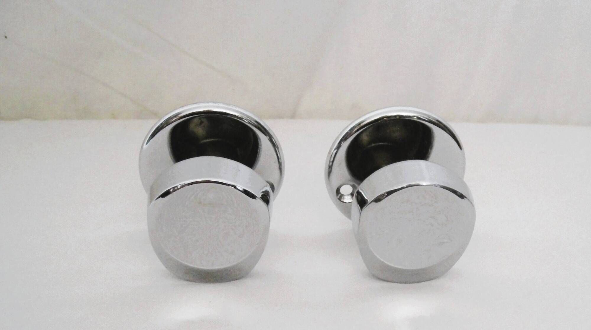 Pair of stainless steel coat racks from the 1970s.
