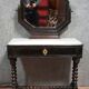 Napoleon III style dressing table in blackened wood, featuring an elegant octagonal mirror