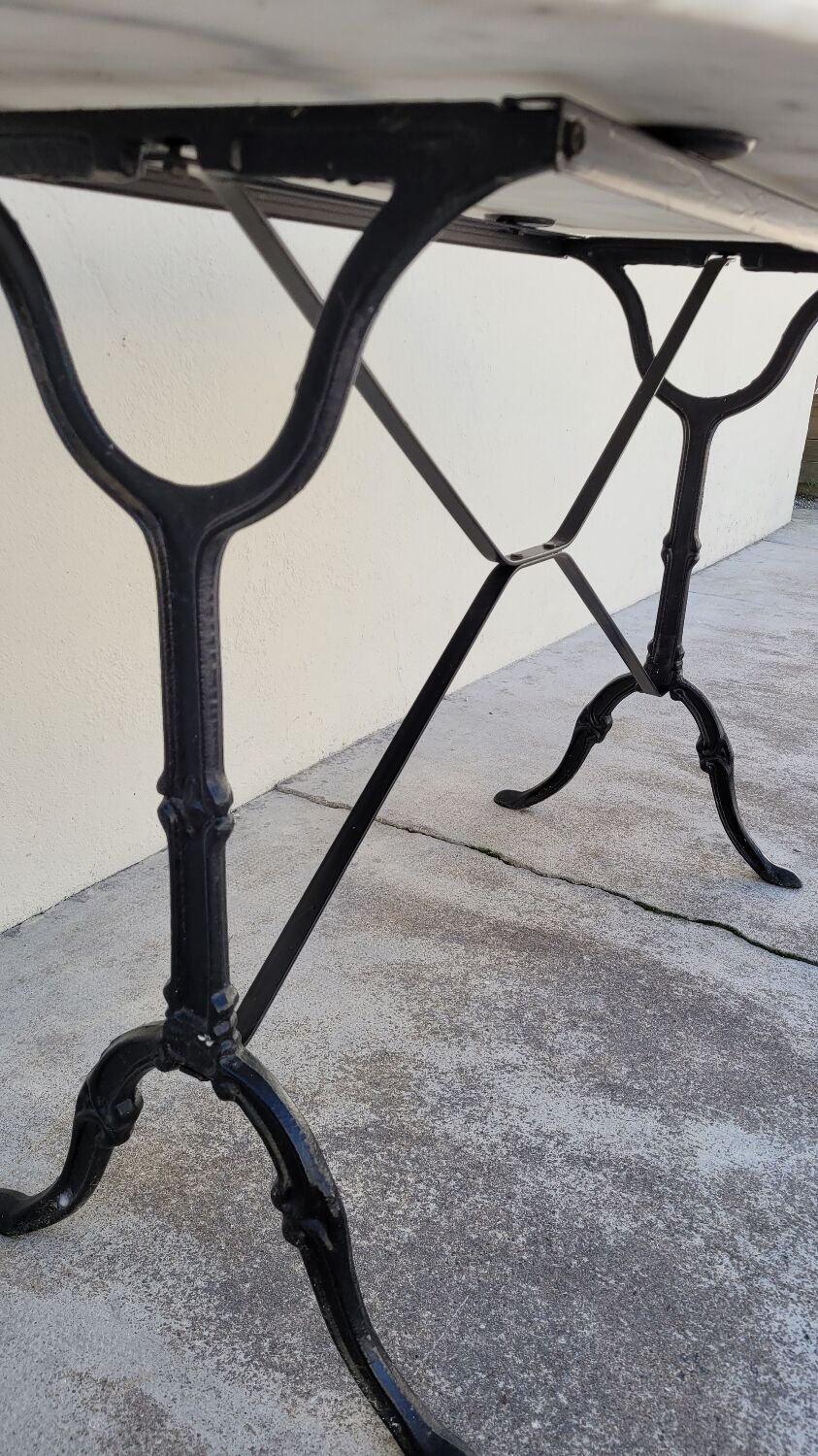 Cast iron bistro table and old oval marble top