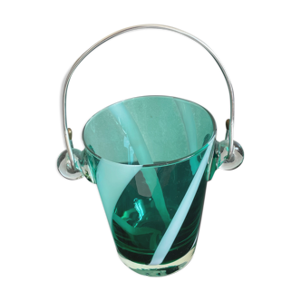 Bucket with ice cubes colored green glass