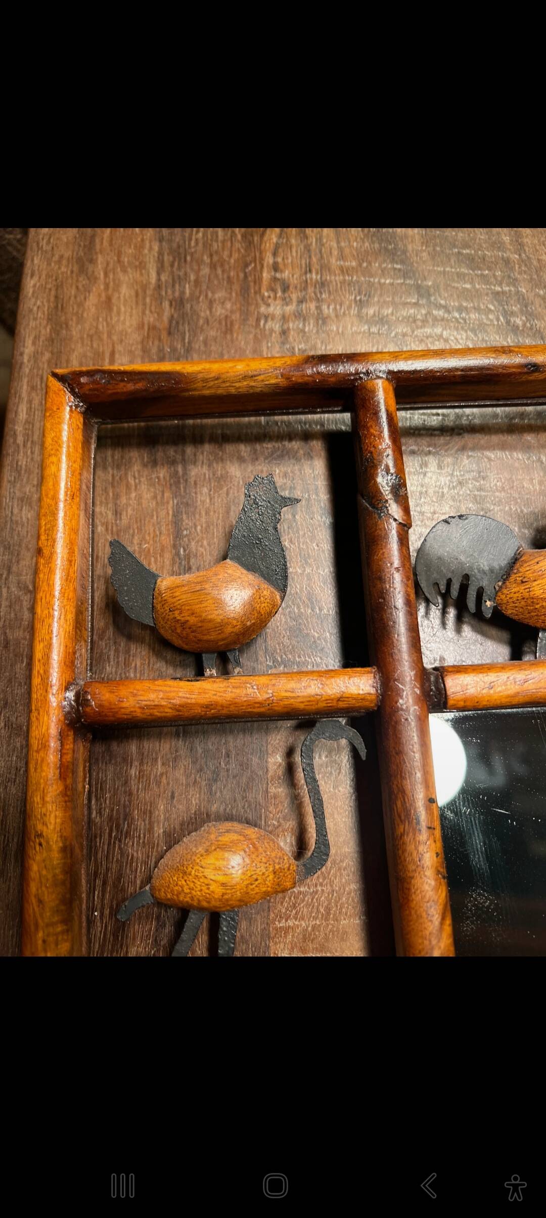 Wrought iron wood animal mirror