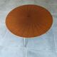 Vintage round coffee table in sun veneer – W. Germany, an