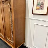 Rattan wardrobe with compass feet