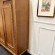 Armoire rotin pieds compas