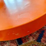 Round orange plastic side table 1970