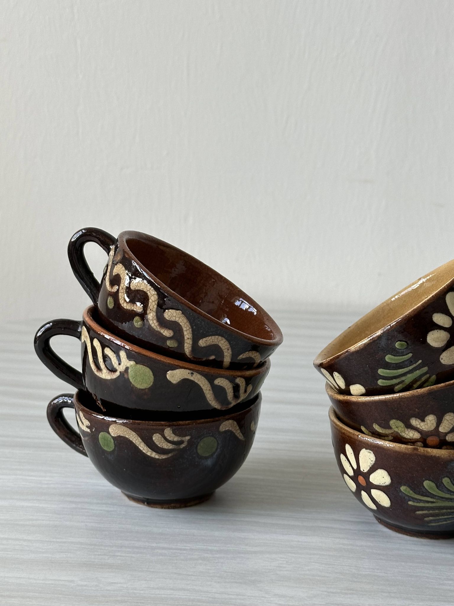 Lot of mismatched Alsatian pottery coffee cups