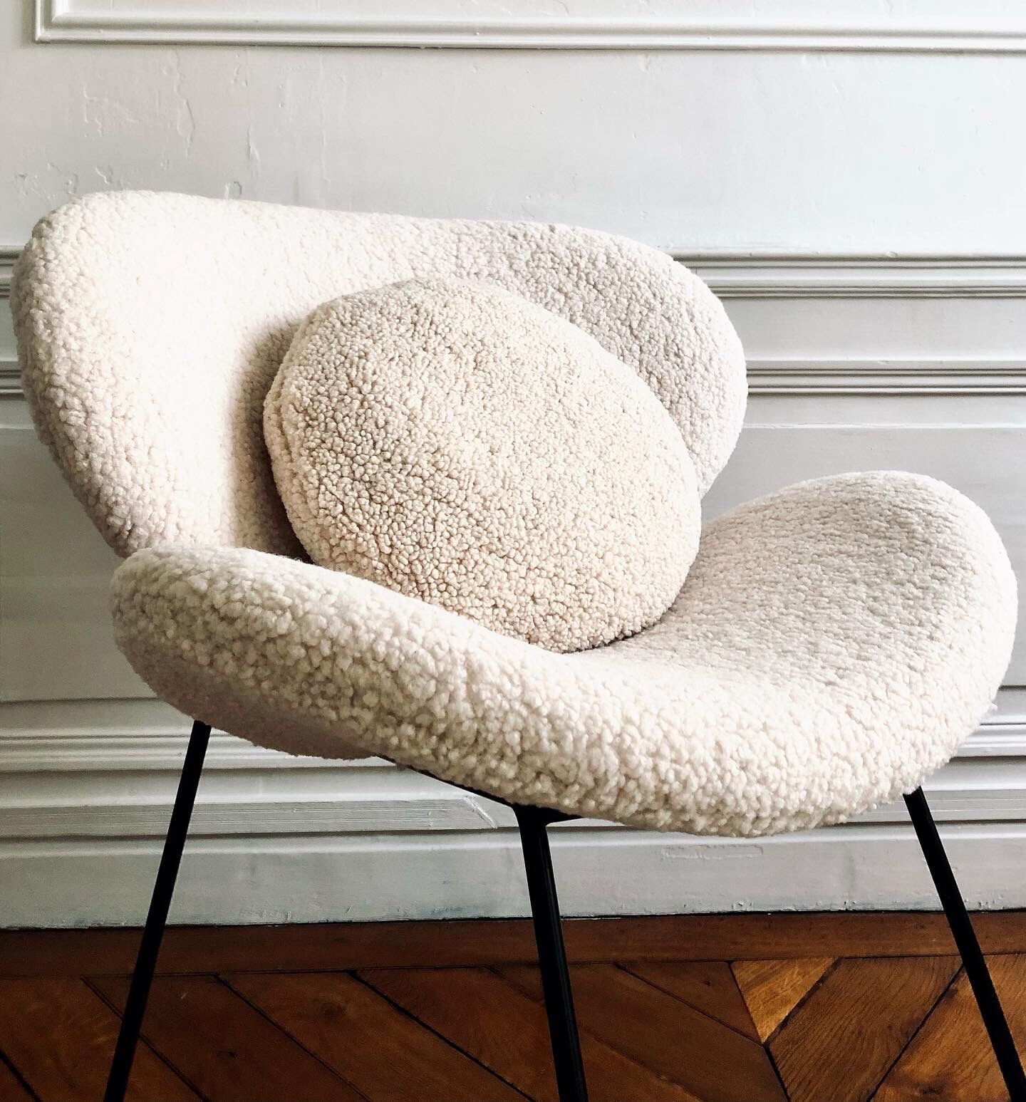 Contemporary design armchair in sheepskin