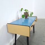 Jaren 50 ladekastje met blauw blad en zwarte poten