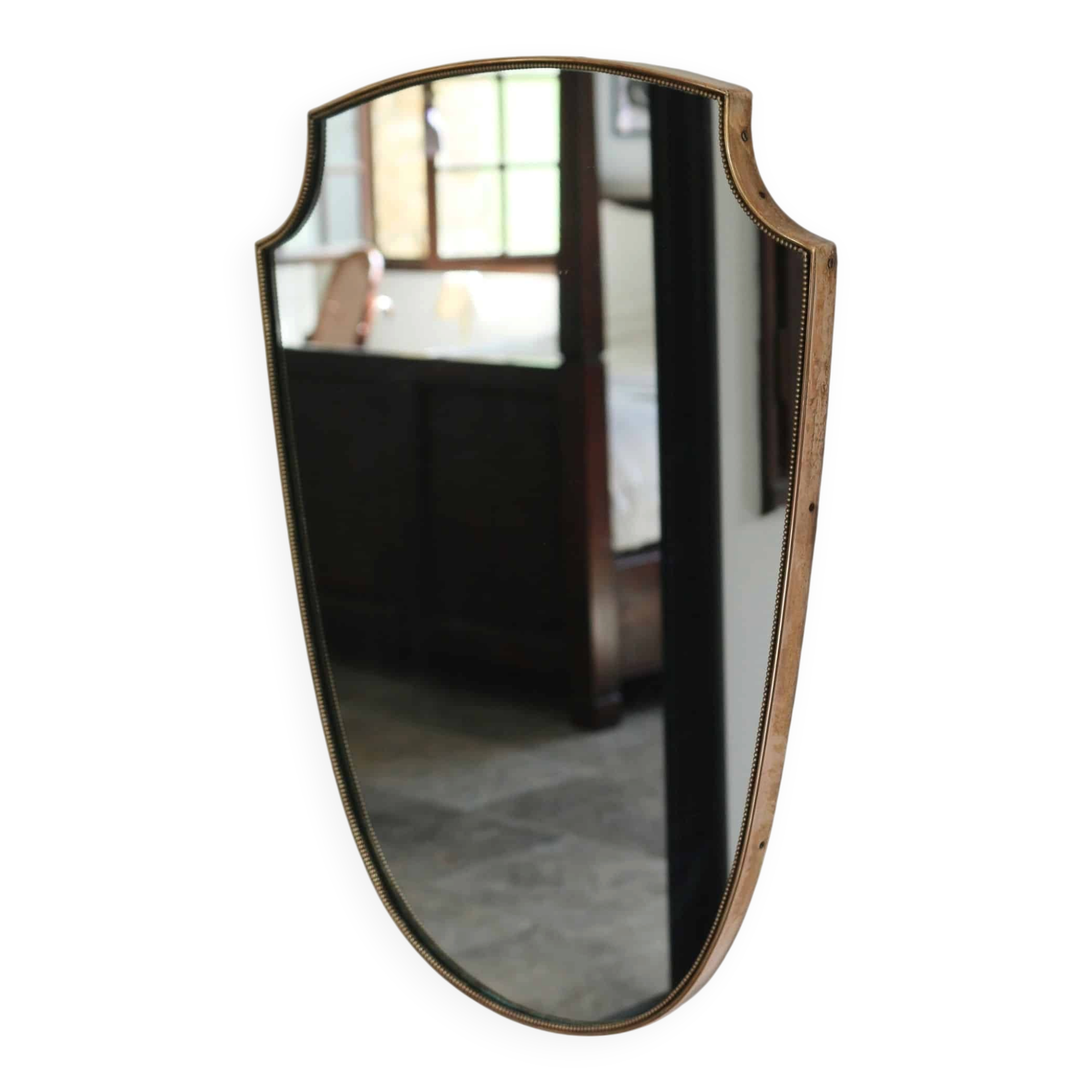 Brass mirror with crest, bead frieze, Italian design style.