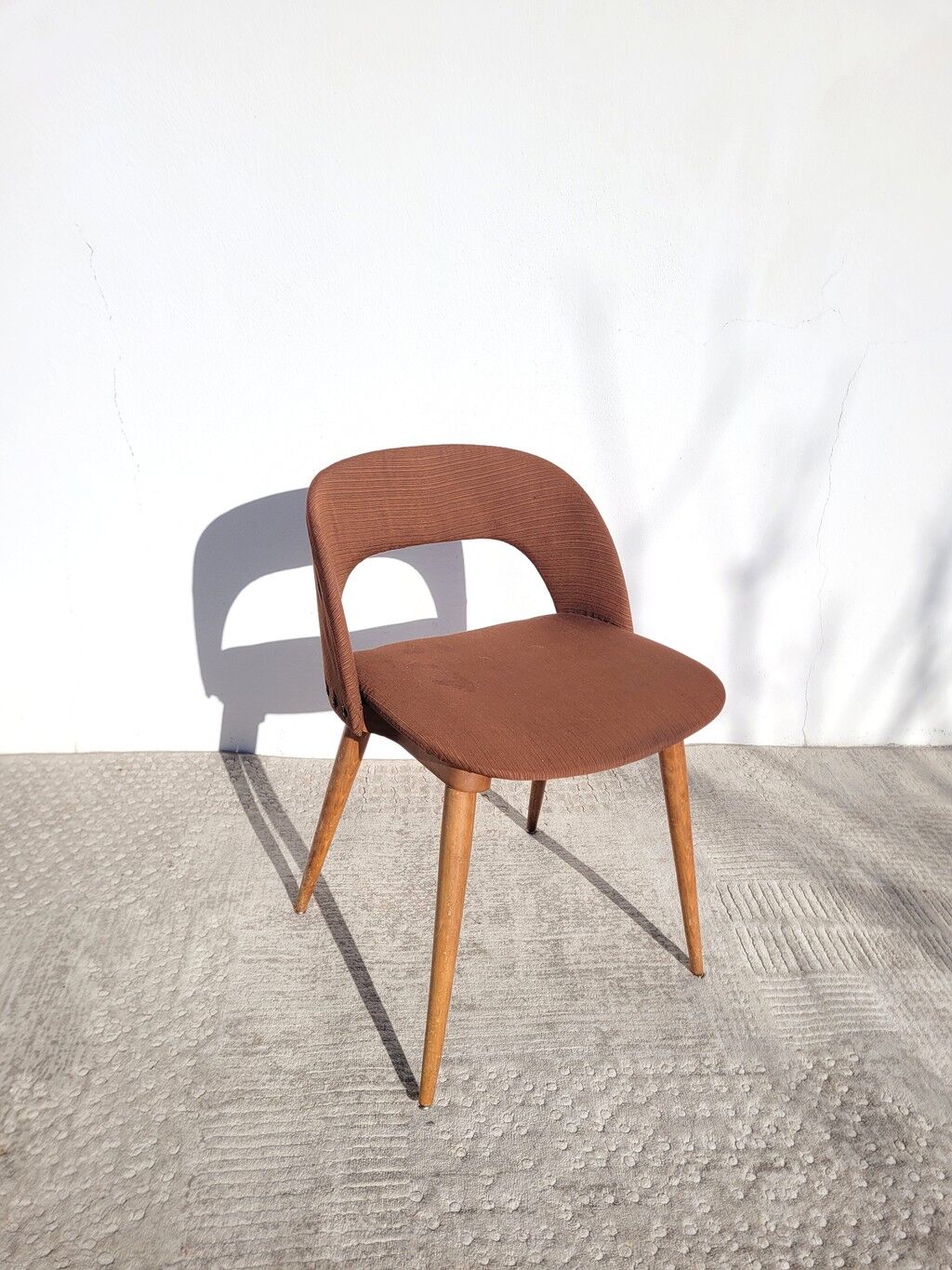 Wood and fabric chair from the 60s/70s.