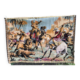 Orientalism tapestry with hunting scene of Arab warriors and lions