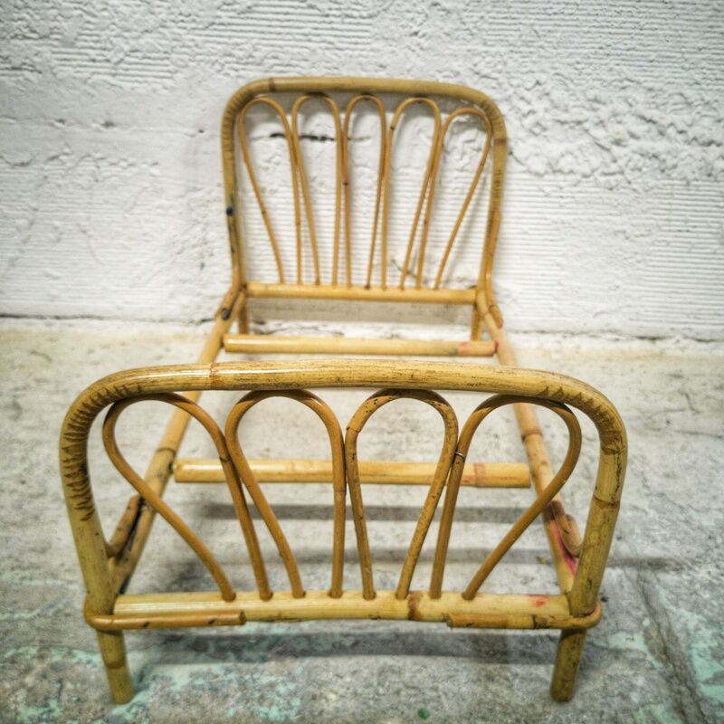 Rattan doll bed