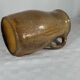 Turned sandstone pitcher