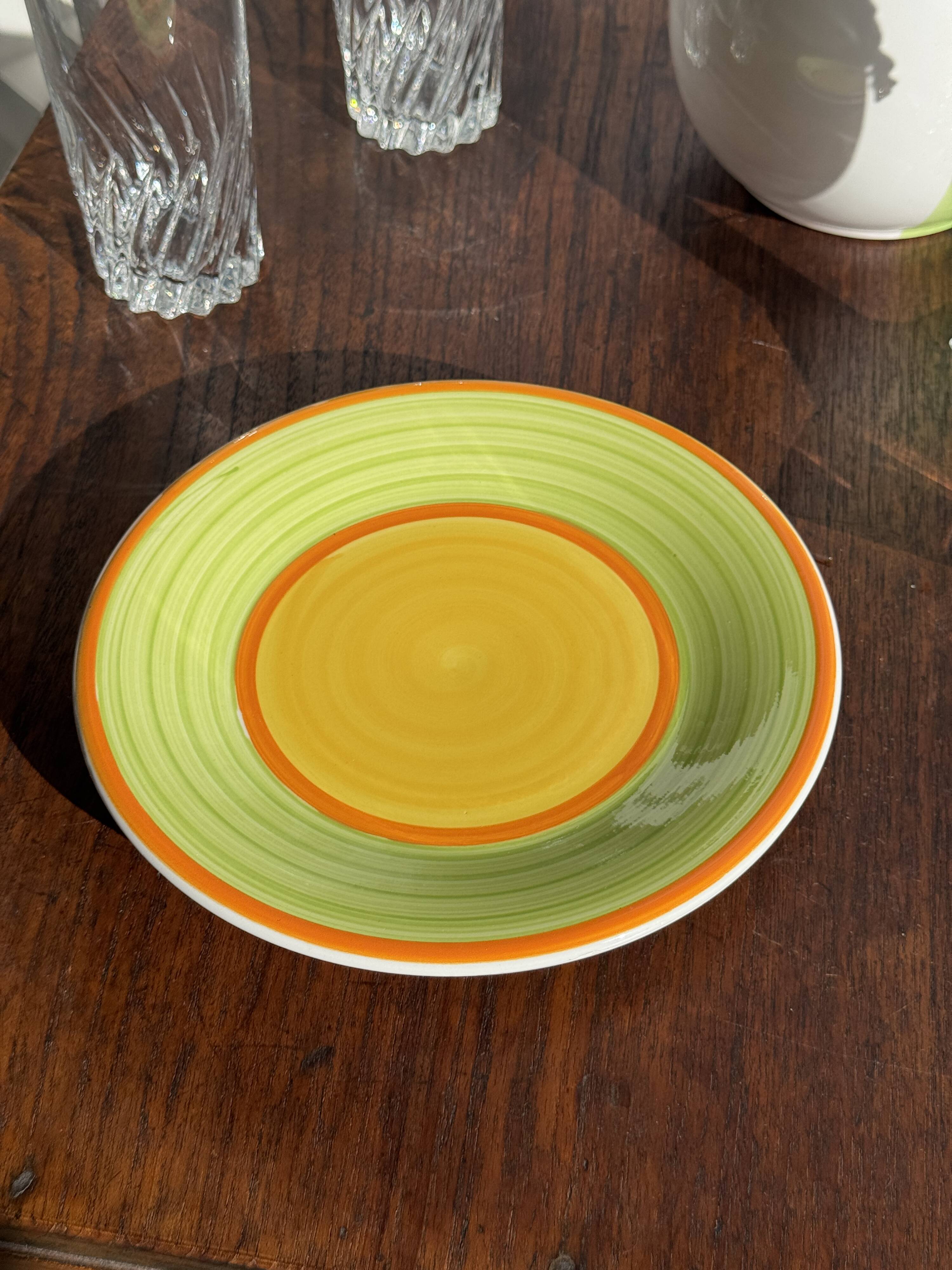 Set of 4 Italian ceramic plates in green, orange, and yellow splashes D20.