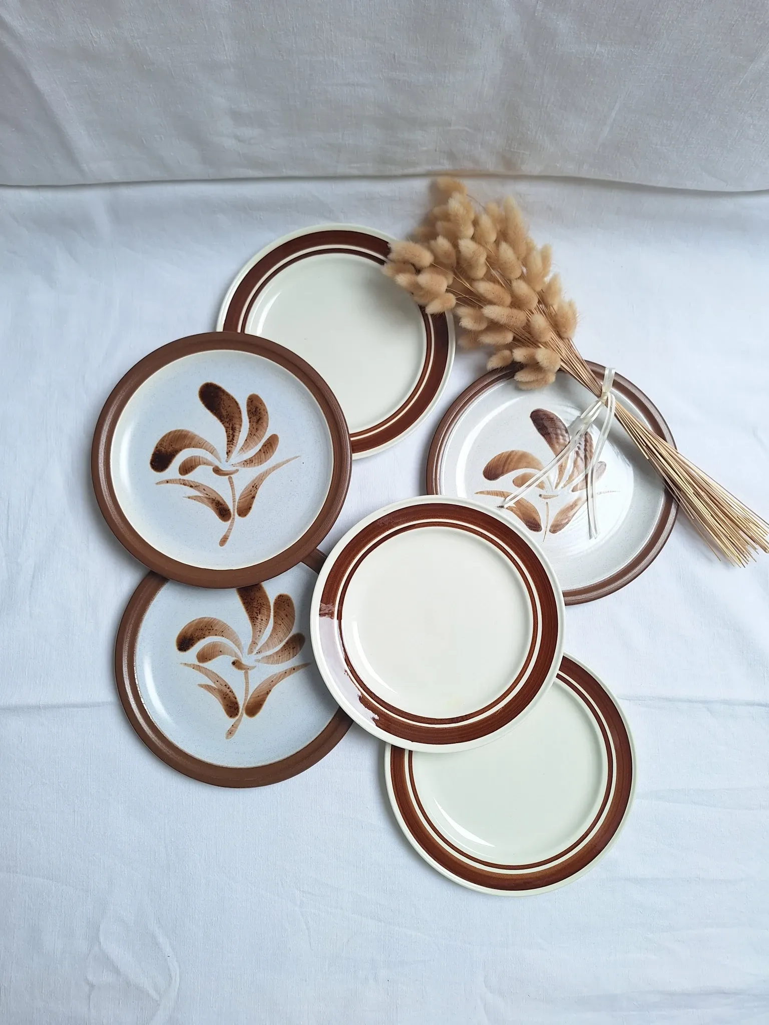 Brown flower-patterned plates from the 1970s.