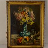 Still life with vase and bouquets of flowers