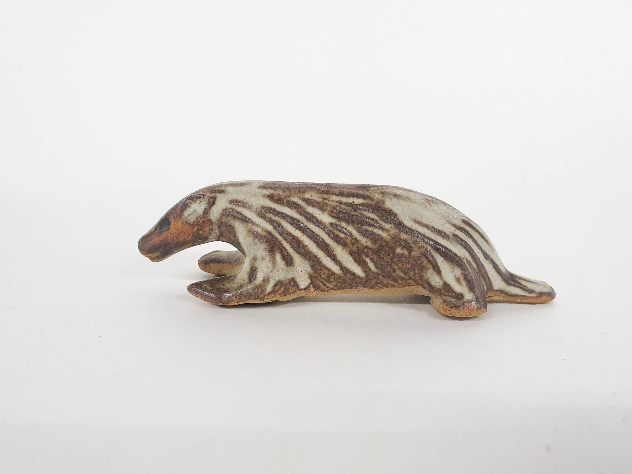 Small ceramic skunk sculpture by Tremar Pottery, United Kingdom