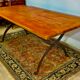 Rectangular wooden table, legs and spacer in hammered ironwork, 60s