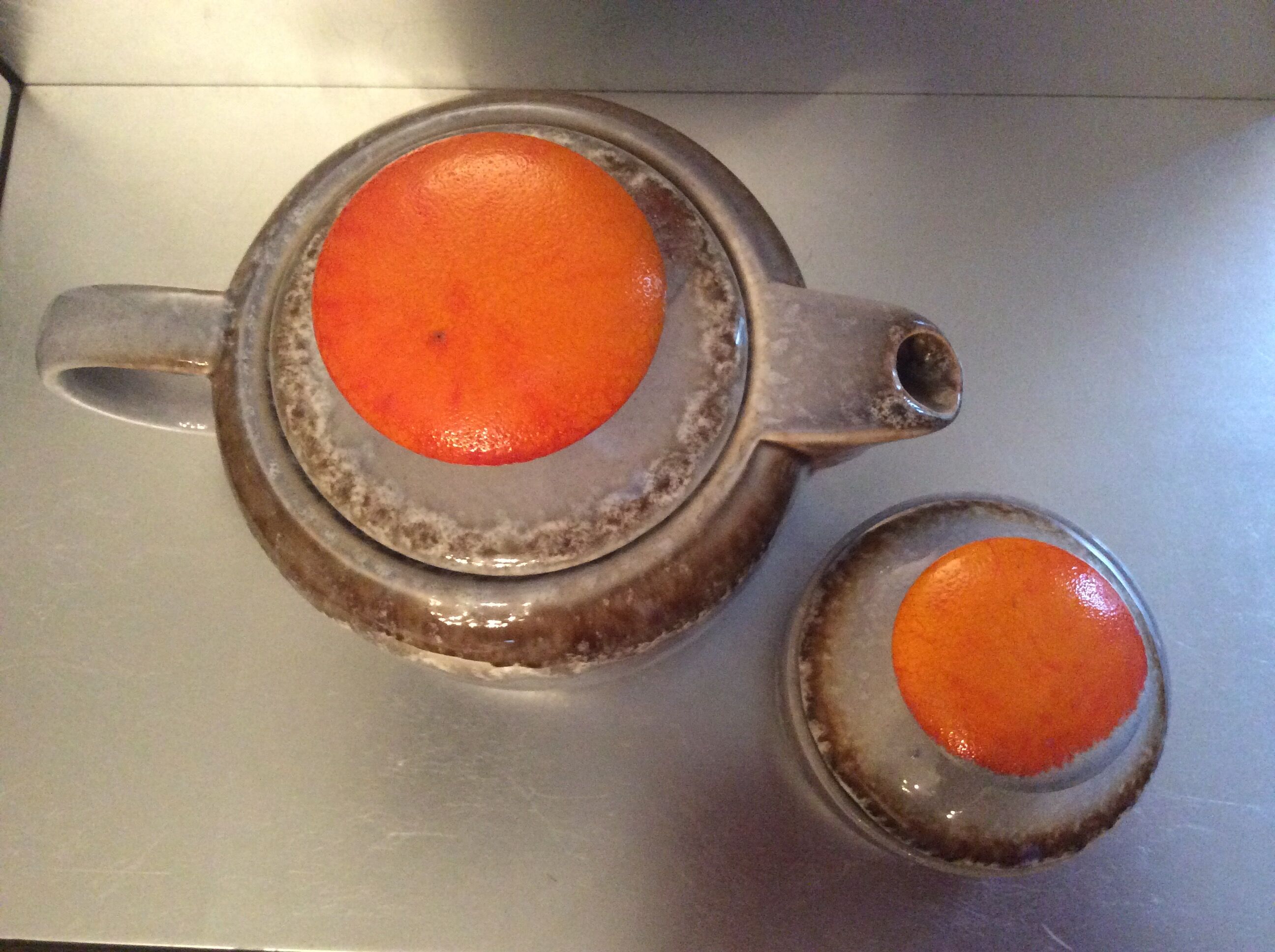 A teapot set and its vintage DDR-Germany sugar maker from the 1960s
