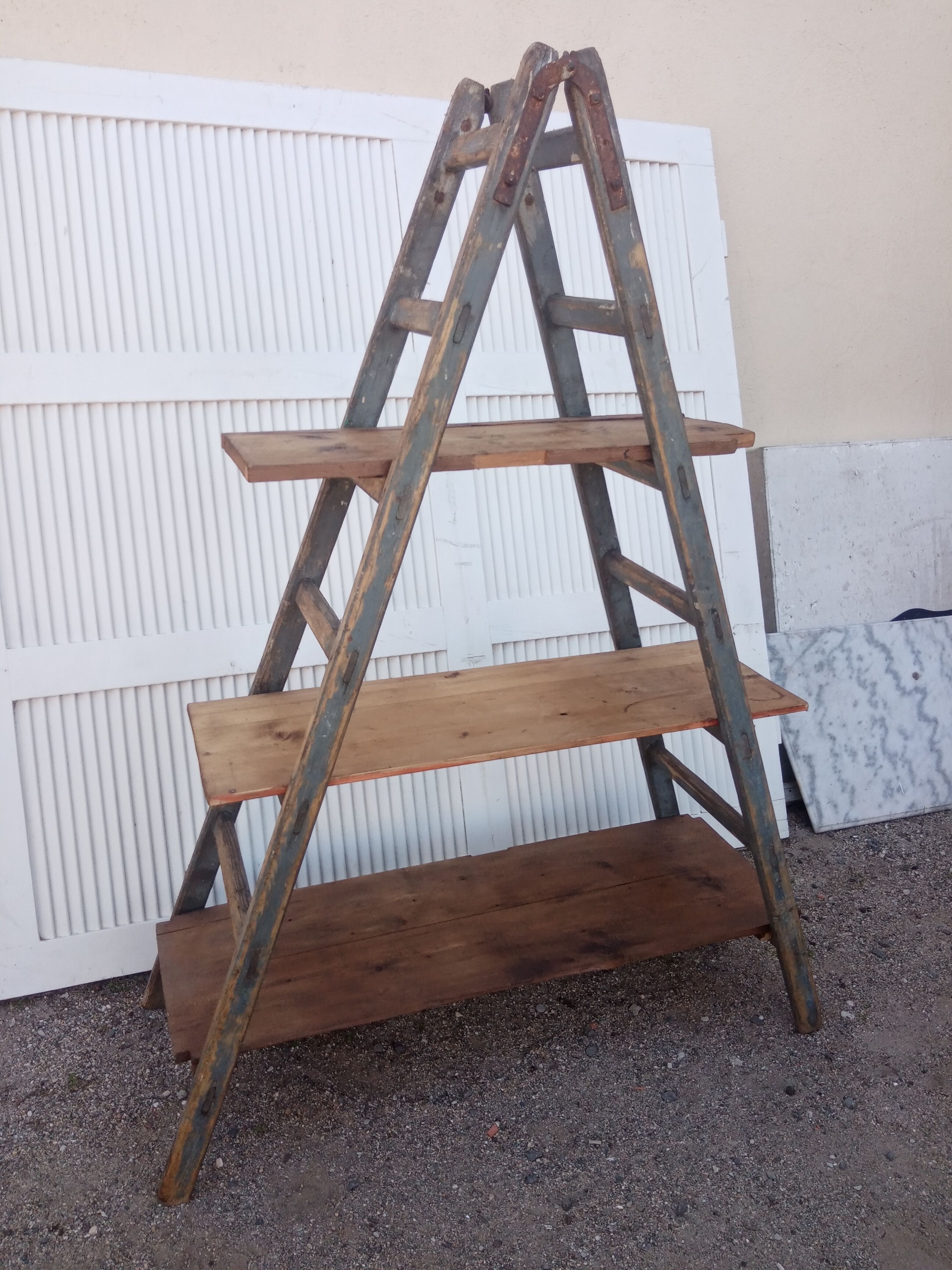 Old stepladder wooden shelf