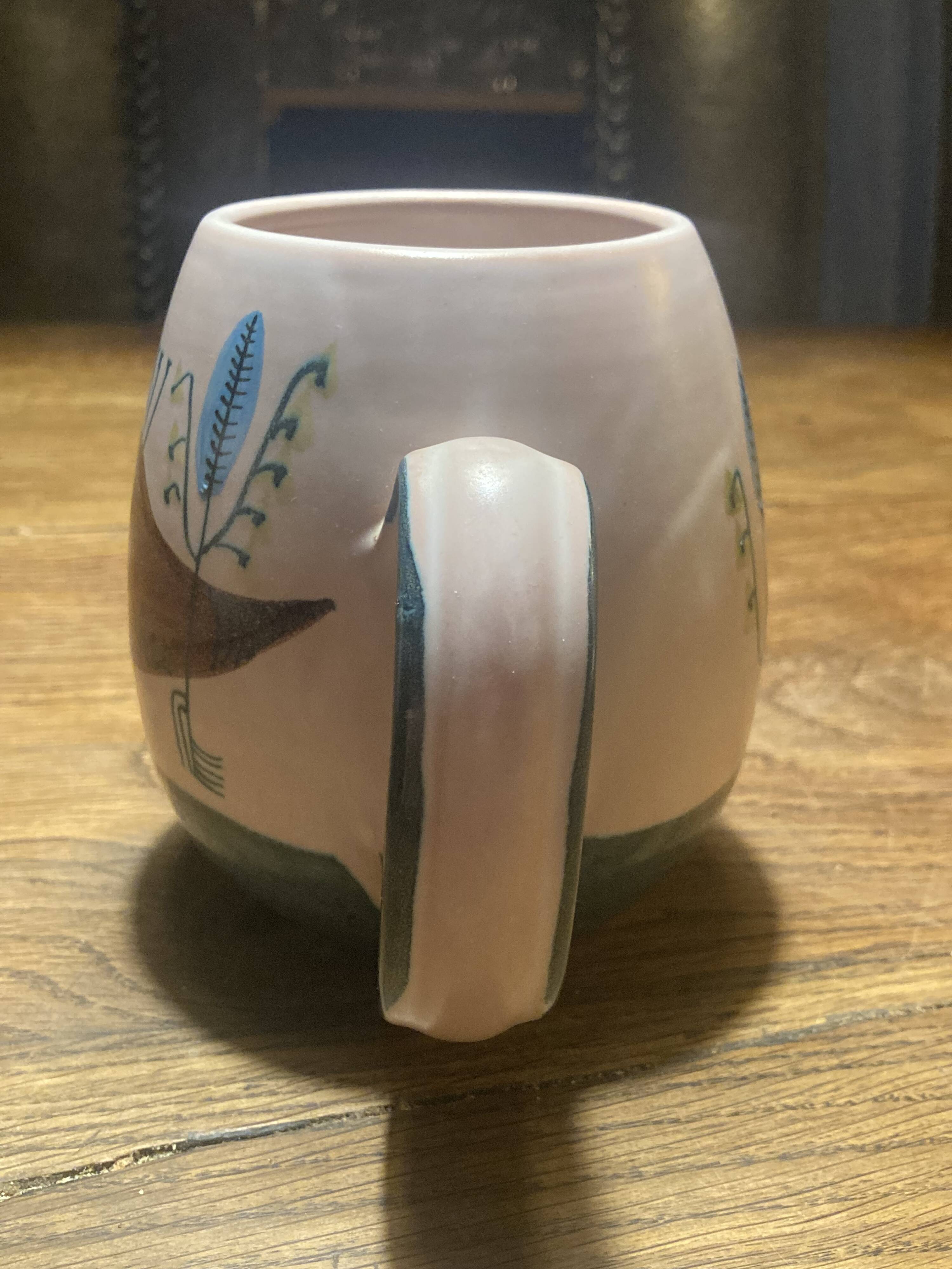 Set of two ceramic mugs signed Yvon ROY