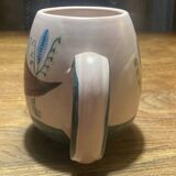 Set of two ceramic mugs signed Yvon ROY