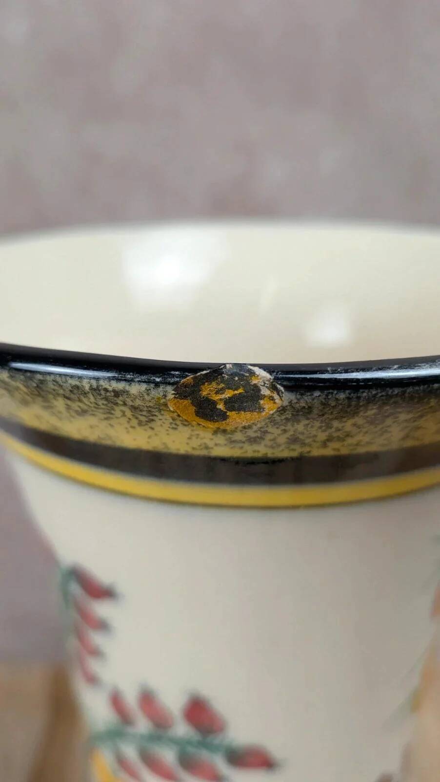 Antique Henriot Quimper vase with Breton floral decoration.