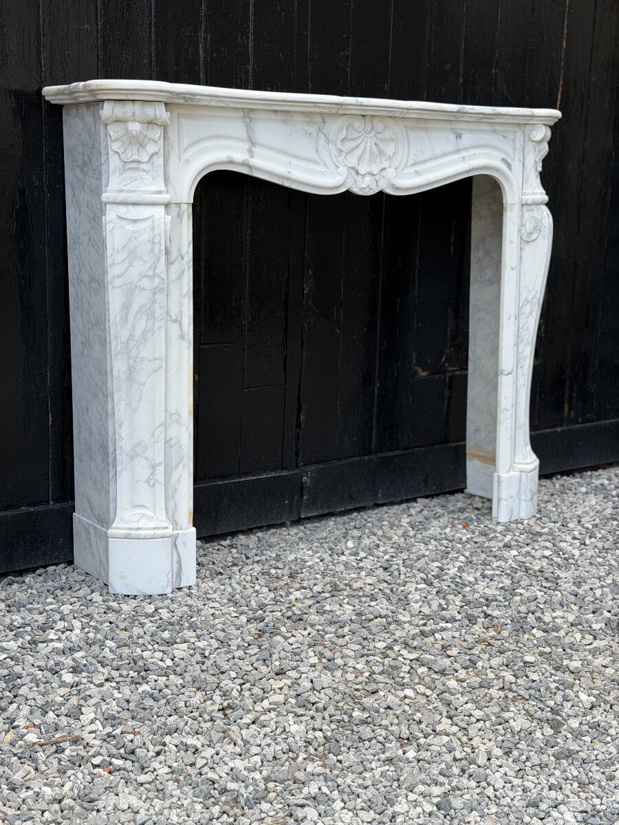 Louis XV style fireplace in Arabescato Carrara marble, circa 1880.