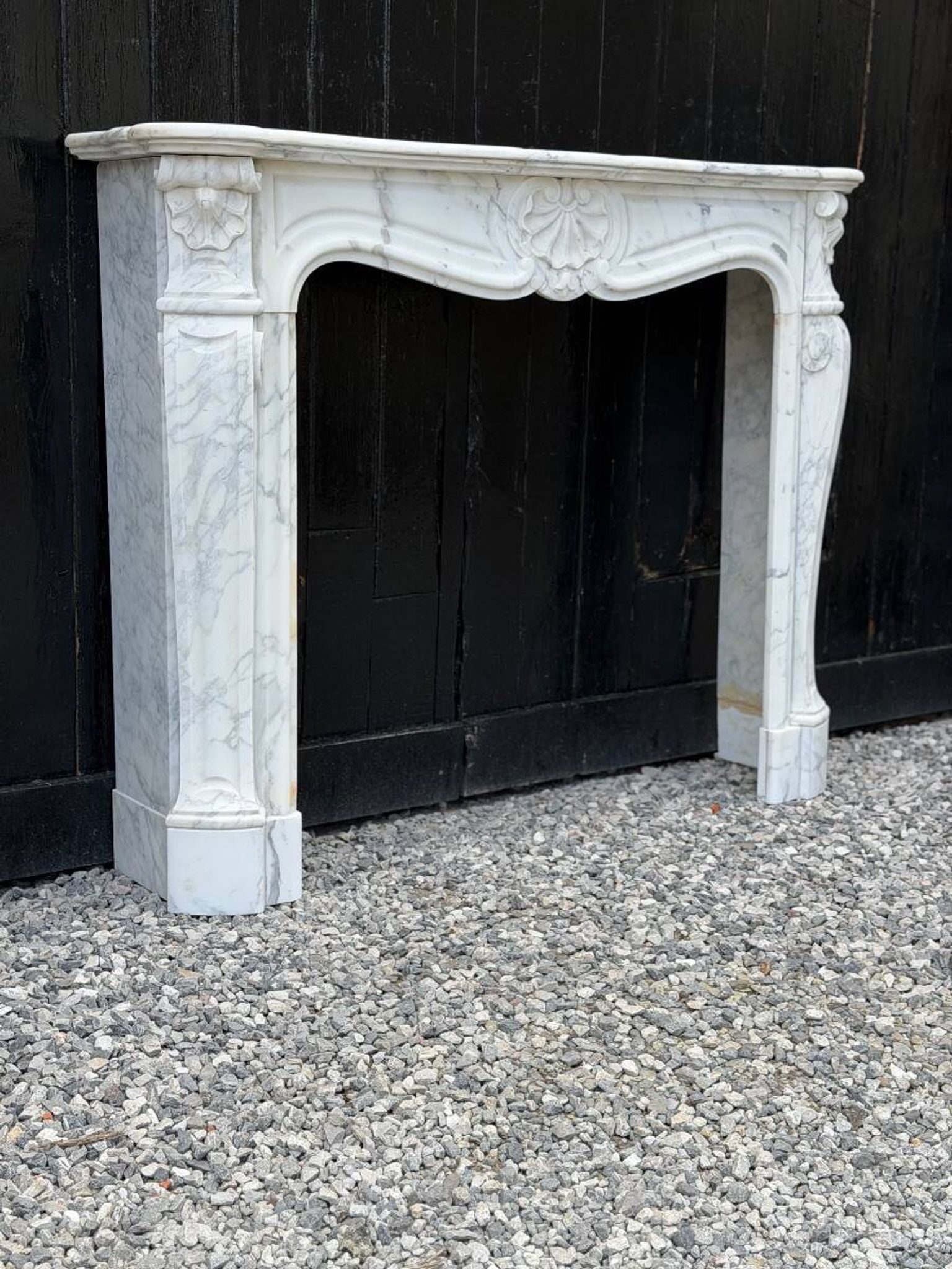 Louis XV style fireplace in Arabescato Carrara marble, circa 1880.