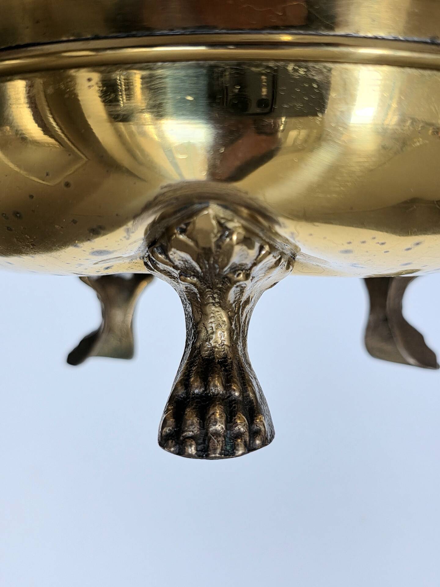 Hollywood Regency style umbrella stand, brass finish and lio pattern.
