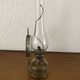 Oil lamp with glass pedestal and integrated round mirror