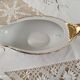 White porcelain saucière evor france frieze golden crosses